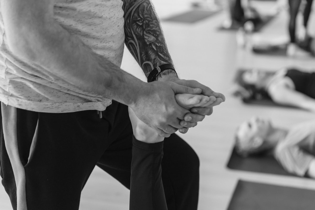 Healthcare professional demonstrating proper posture and movement alignment